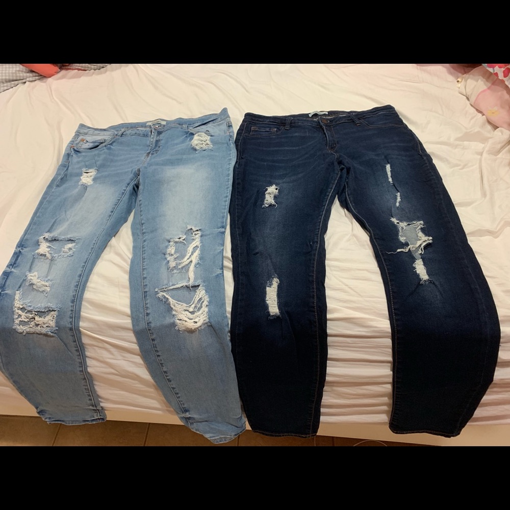 Two pairs of ripped skinny jeans
